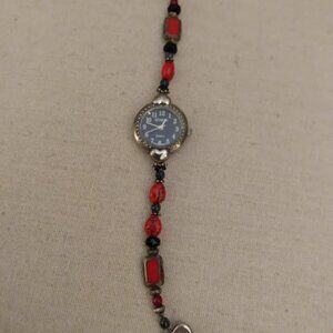 Geneva: Womans red quartz watch. Japan movement.